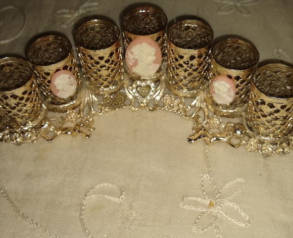 Vintage filigree lipstick holder.